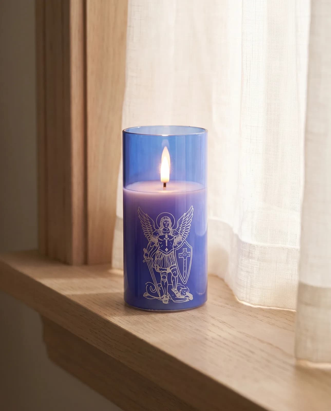 St. Michael candle, blue glass, scene