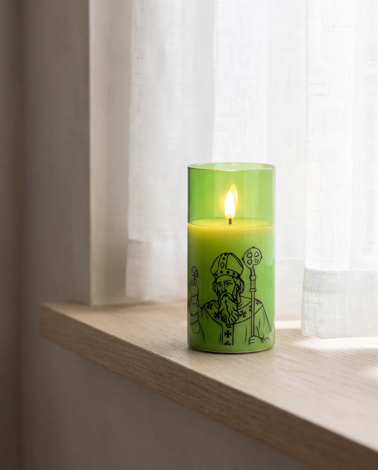 St. Patrick candle, green glass, scene